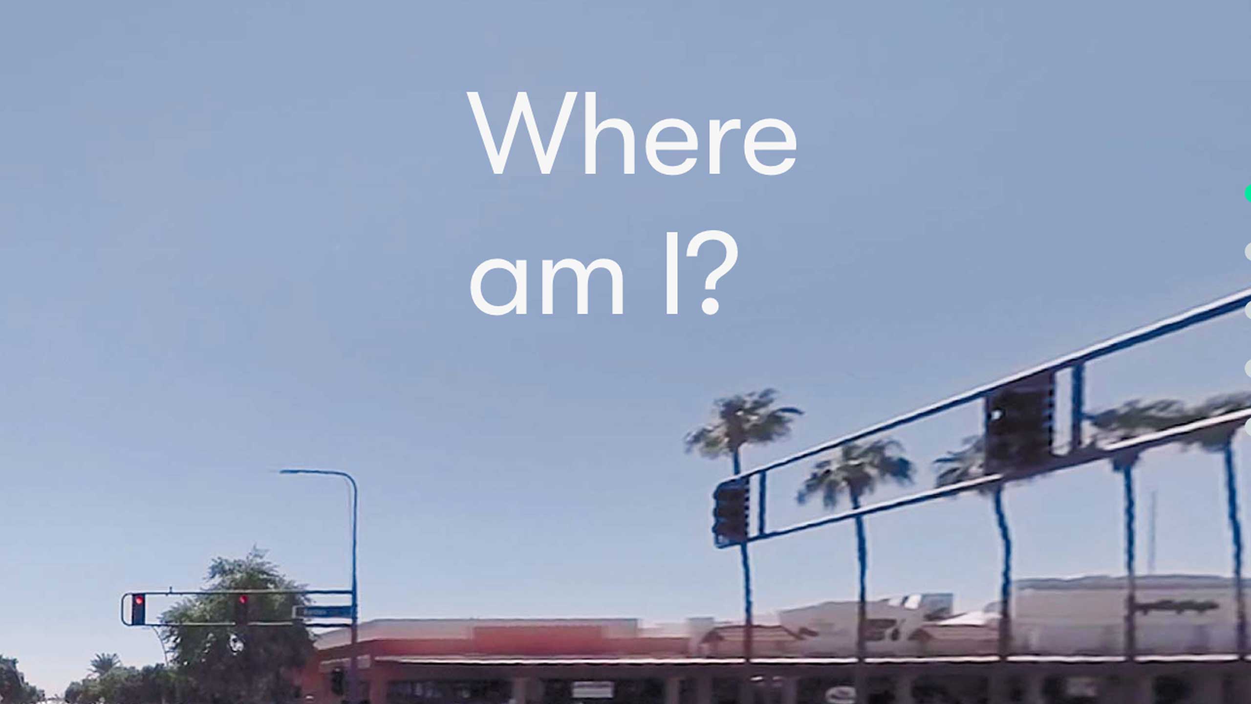 Words saying "Where am I?" appear over a zoomed-in photo with visible pixelation